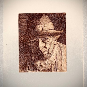 Portrait of a Man with a Hat